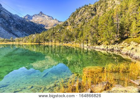 Beautiful high altitude lake (les Laquettes) located in Pyrenees Mountains in Neouvielle Massif.