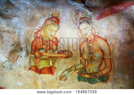 Frescoes in Sigiriya Lion Rock. Apsaras. Sri Lanka.