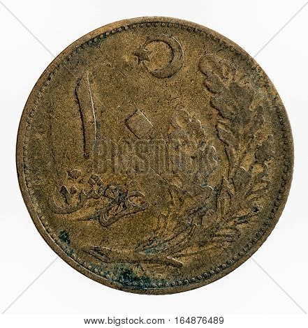 Old Turkish oxidized coin, top closeup view.