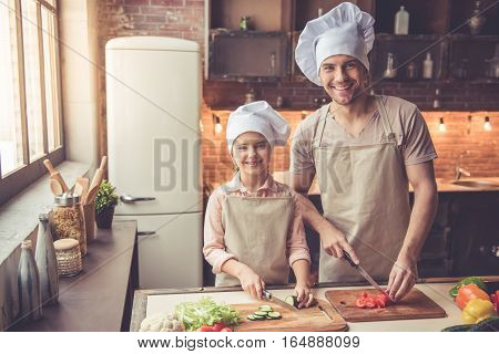 Father And Daughter Cooking