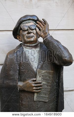 STOCKHOLM SWEDEN - AUGUST 19 2016: Evert Taube Monument (1890-1976) one of the famous Swedish composerswriters and actors located on Järntorget Gamla Stan in Stockholm Sweden on August 19 2016.