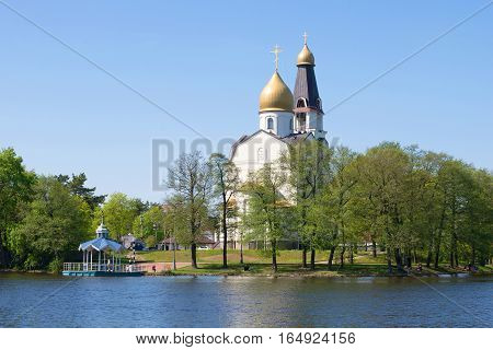 Church of the apostles Peter and Paul on the lake Sestroretsky Razliv. Sunny may day. Sestroretsk, Russia