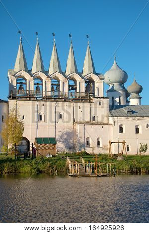 Belfry of the Tikhvin Uspensky monastery in the October evening close up. Tikhvin, Russia