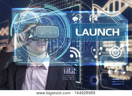 Business, Technology, Internet And Network Concept. Young Businessman Working In Virtual Reality Gla