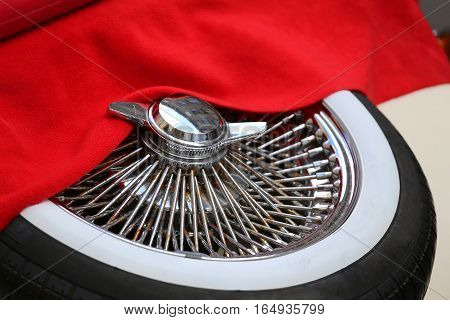 Spare Tire With Chrome Rim Of An Ancient Fabulous Vintage Car