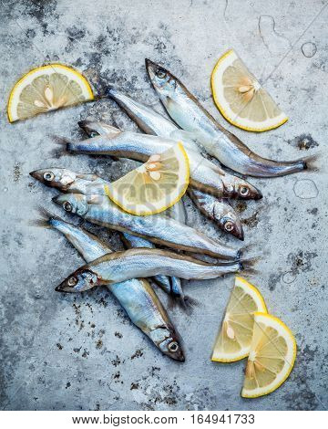 Fresh Catch Shishamo Fish Fully Eggs Flat Lay On Shabby Metal Background. Shishamo Fish Is Popular F