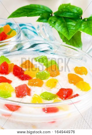 View Close-up On Oatmeal With Colorful Candied Fruits