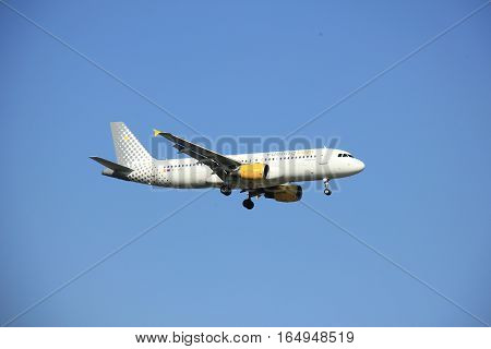 Amsterdam the Netherlands - May 6th 2016: EC-KDX Vueling Airbus A320 approaching Schiphol Polderbaan runway arriving from Barcelona Spain