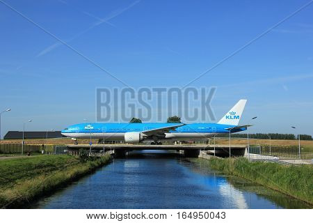 Amsterdam the Netherlands - June 9th 2016: PH-BVI KLM Royal Dutch Airlines Boeing 777 taxiing to Polderbaan runway Schiphol destination Bangkok Thailand