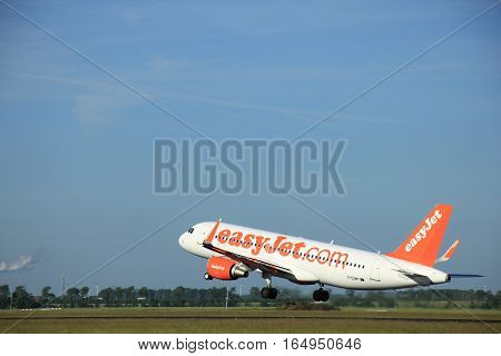 Amsterdam the Netherlands - June 9th 2016: G-EZWY easyJet Airbus A320-214(WL) takeoff from Polderbaan runway destination Basel Switzerland