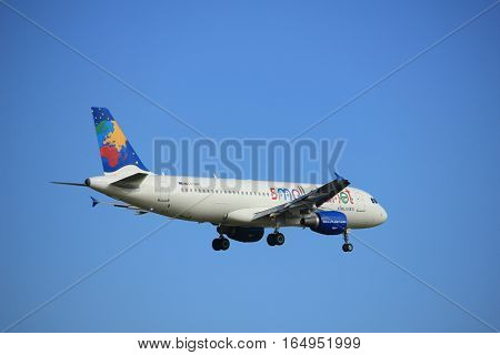 Amsterdam the Netherlands - July 15th 2016: LY-SPF Small Planet Airlines Airbus A320-214 approaching Polderbaan runway at Schiphol Amsterdam Airport arriving from Las Palmas Spain