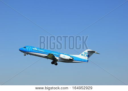 Amsterdam the Netherlands - August 18th 2016: PH-KZU KLM Cityhopper Fokker F70 taking off from Polderbaan Runway Amsterdam Airport Schiphol