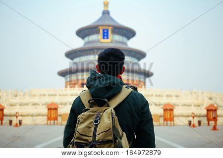 Young Traveler Standing In Front Of Temple Of Heaven - In Beijing, China. Asia Travel