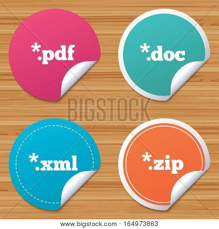 Round stickers or website banners. Document icons. File extensions symbols. PDF, ZIP zipped, XML and DOC signs. Circle badges with bended corner. Vector