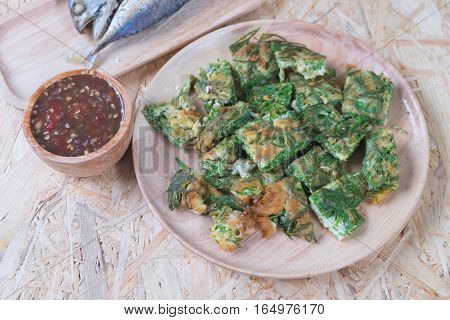 cha-om egg with sauce (Nam prik kapi) Thai traditional food