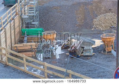 Construction site with a few plant and machinery at an early stage