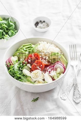 Couscous and vegetables bowl. Healthy diet vegetarian food concept. On a light background . Vegetarian buddha bowl