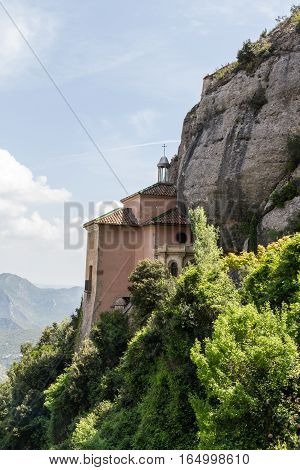 A small church built on top of a mountain near Barcelona, Spain