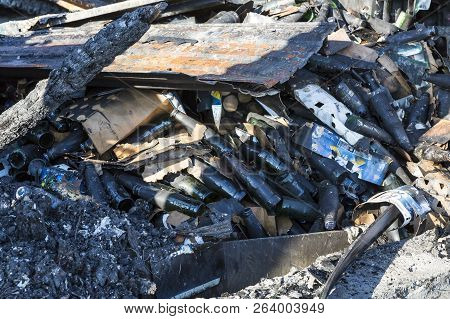 Damaged Industry Supermarket Metallic Facade After Arson Fire With Burnt Debris After Intense Burnin