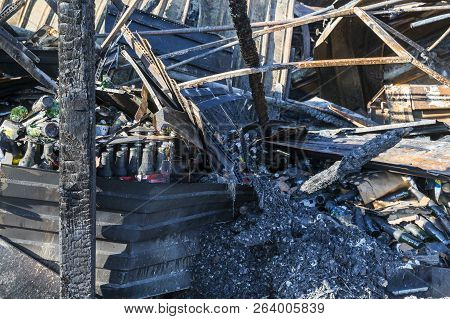 Damaged Industry Supermarket Metallic Facade After Arson Fire With Burnt Debris After Intense Burnin