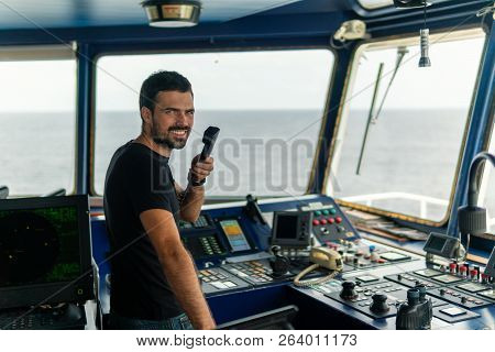 Marine Navigational Officer Is Reporting By Vhf Radio