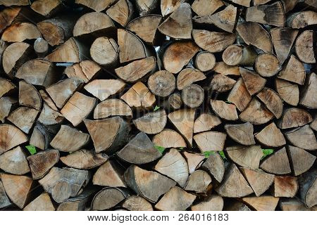 Firewood Stacked For Storage. Store Firewood. Wood Burned As Fuel.