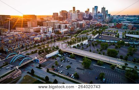 Epic Sunburst Lens Flare Sunrise Above Denver Colorado Downtown Skyline And River During Perfect Daw