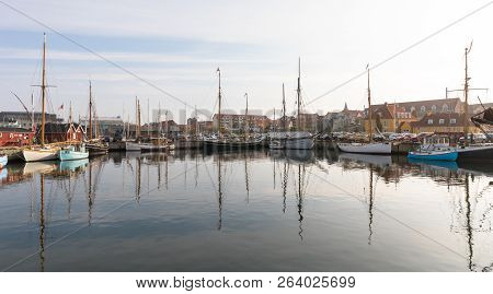 Holbaek, Denmark - October 2018: Beautiful Old Sail Boats Lying At The Bay In Holbaek, A Small Town 