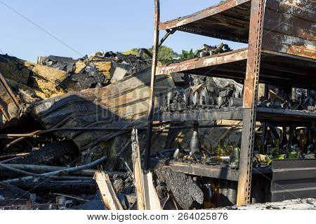 Damaged Industry Supermarket Metallic Facade After Arson Fire With Burnt Debris After Intense Burnin