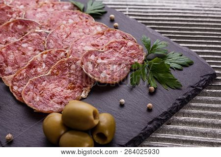Saucisson Sec Delicious French Salami On A Wooden Background