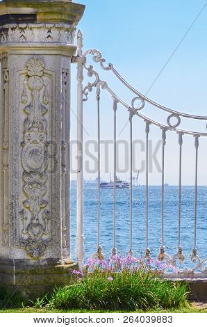 View Of The Bosphorus Through The White Lattice Of The Dolmabahche Palace. Istanbul, Turkey