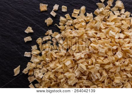 Fragrant Dried Parsnip On A Dark Stone Background