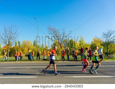 Poznan, Poland - October 14, 2018: Many People Running On A Street During The Pko Poznan Marathon On