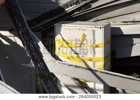 Damaged Industry Supermarket Metallic Facade After Arson Fire With Burnt Debris After Intense Burnin