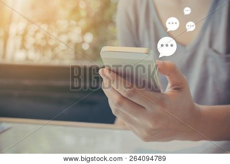Hand Of Woman Typing Text On Mobile Smartphone. Online Live Chat Chatting On Application Communicati