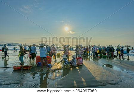 Mui Ne, Vietnam - September 28th, 2018: Fish Market Session Seas Scene People Gathered Inside Basket