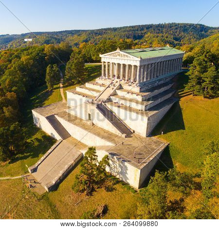 DONAUSTAUF / GERMANY - OCTOBER 14, 2018: The Walhalla is a hall of fame that honors laudable and distinguished people in German history. The hall is a neo-classical building above the Danube River.