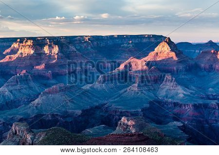 Sunrise At Mather Point, Grand Canyon National Park, Arizona. Photo Shows A Group Of Tourists Watchi