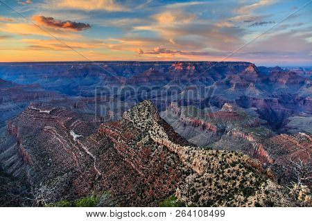 Sunrise At Mather Point, Grand Canyon National Park, Arizona. Photo Shows A Group Of Tourists Watchi