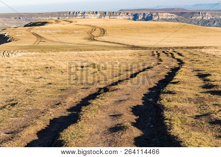 Travel To North Caucasus Region Region - Dirty Road On Top Of Bermamyt Mountain Plateau At September