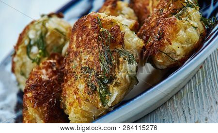 Bafela  Cabbage Muthias - Teamed Spiced Dumplings, Made With Gramflour, Cabbage, And Spices.