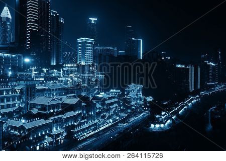 CHONGQING, CHINA â MARCH 13: Hongyadong shopping complex at night on March 13, 2018 in Chongqing. With 17M population, it is the most populous Chinese municipality.