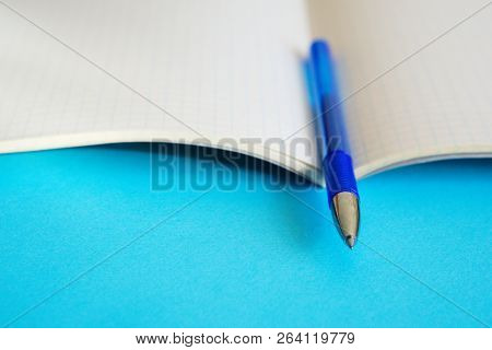 Time For Business And Study. The Blue Fountain Pen Lies On The Notebook For Mathematics.