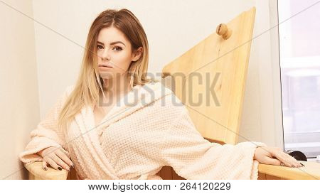 Barrel Cedar. Wellness Spa Sauna. Aromatherapy Treatment. Young Beauty Woman. Girl Face.