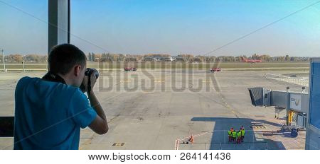 Borispil - Ukraine - October 2018: Photographer Shoots Belgian Airline Plane 
