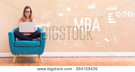 Mba With Young Woman Using Her Laptop In A Chair