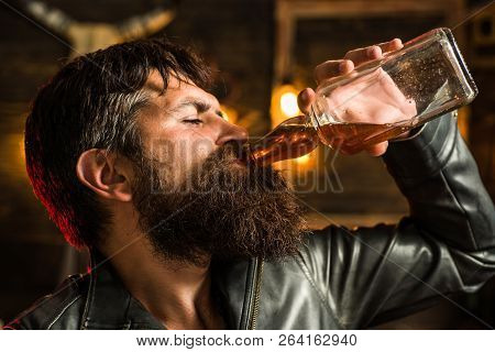 Man Drinking Alcohol. Whisky, Brandy Or Cognac Concept. Serious Sad Man Having Alcohol Addiction. Al