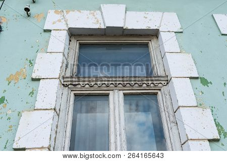 Old, Ornamented Window Close Up Shot On European Abandoned Residentual House.