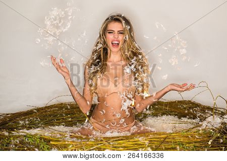 Angel Woman In Nest With Feather White. Beautiful Fairy Flying Girl In White Dress. Romantic Young B
