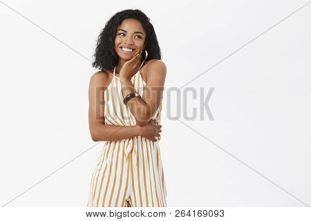 Portrait Of Charming Elegant Dark-skinned Female Enjoying Awesome Party Wearing Cute Yellow Striped 
